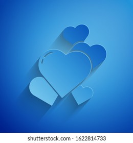Paper cut Heart icon isolated on blue background. Romantic symbol linked, join, passion and wedding. Valentine day symbol. Paper art style. Vector Illustration
