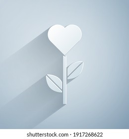Paper cut Heart shape in a flower icon isolated on grey background. Paper art style. Vector