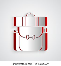 Paper cut Hiking backpack icon isolated on grey background. Camping and mountain exploring backpack. Paper art style. Vector Illustration