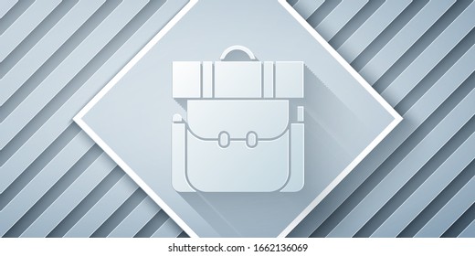 Paper cut Hiking backpack icon isolated on grey background. Camping and mountain exploring backpack. Paper art style. Vector Illustration