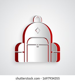 Paper cut Hiking backpack icon isolated on grey background. Camping and mountain exploring backpack. Paper art style. Vector Illustration