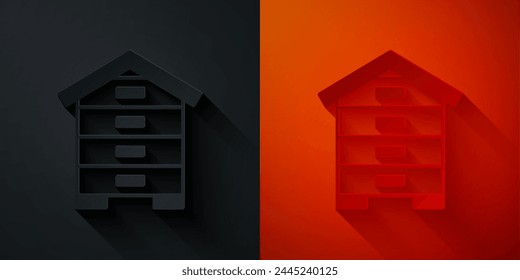 Paper cut Hive for bees icon isolated on black and red background. Beehive symbol. Apiary and beekeeping. Sweet natural food. Paper art style. Vector