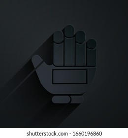 Paper cut Hockey glove icon isolated on black background. Sports playing and training protective gloves on hands. Paper art style. Vector Illustration
