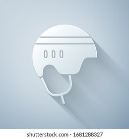 Paper cut Hockey helmet icon isolated on grey background. Paper art style. Vector Illustration