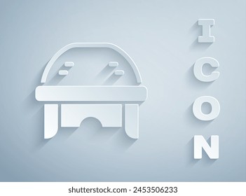Paper cut Hockey helmet icon isolated on grey background. Paper art style. Vector