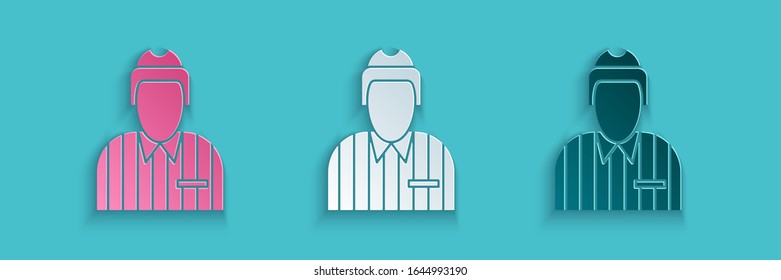 Paper cut Hockey judge, referee, arbiter icon isolated on blue background. Paper art style. Vector Illustration