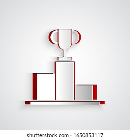 Paper cut Hockey over sports winner podium icon isolated on grey background. Paper art style. Vector Illustration