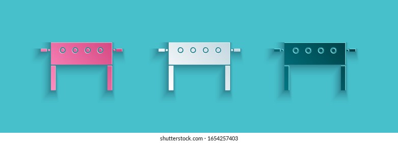 Paper cut Hockey table icon isolated on blue background. Paper art style. Vector Illustration