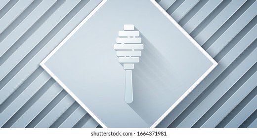 Paper cut Honey dipper stick icon isolated on grey background. Honey ladle. Paper art style. Vector Illustration