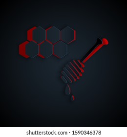 Paper cut Honeycomb with honey dipper stickicon isolated on black background. Honey ladle. Honey cells symbol. Sweet natural food. Paper art style. Vector Illustration