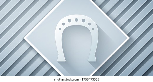 Paper cut Horseshoe icon isolated on grey background. Paper art style. Vector Illustration