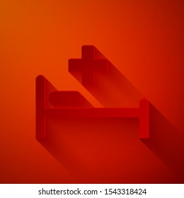Paper cut Hospital Bed with Medical symbol of the Emergency - Star of Life icon isolated on red background. Paper art style. Vector Illustration