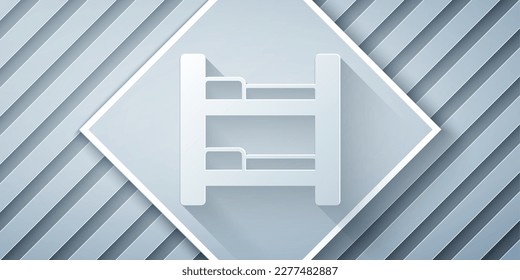 Paper cut Hotel room bed icon isolated on grey background. Paper art style. Vector
