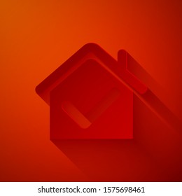Paper cut House with check mark icon isolated on red background. Real estate agency or cottage town elite class. Paper art style. Vector Illustration