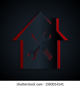 Paper cut House or home with screwdriver and wrench icon isolated on black background. Adjusting, service, setting, maintenance, repair, fixing. Paper art style. Vector Illustration