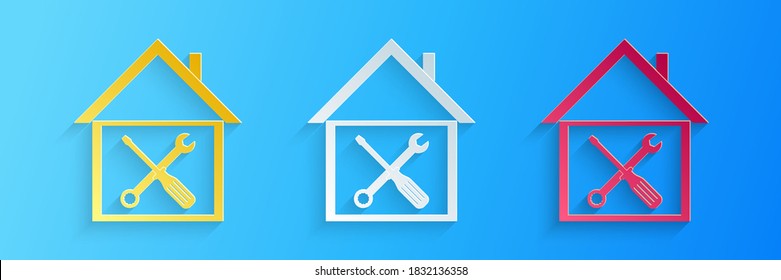 Paper cut House or home with screwdriver and wrench icon isolated on blue background. Adjusting, service, setting, maintenance, repair, fixing. Paper art style. Vector.