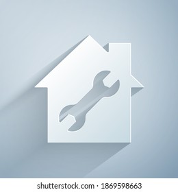 Paper cut House or home with wrench icon isolated on grey background. Adjusting, service, setting, maintenance, repair, fixing. Paper art style. Vector