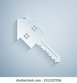 Paper cut House with key icon isolated on grey background. The concept of the house turnkey. Paper art style. Vector Illustration