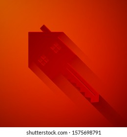 Paper cut House with key icon isolated on red background. The concept of the house turnkey. Paper art style. Vector Illustration