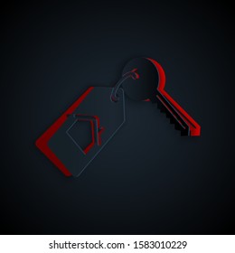Paper cut House with key icon isolated on black background. The concept of the house turnkey. Paper art style. Vector Illustration