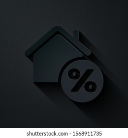 Paper cut House with percant discount tag icon isolated on black background. House percentage sign price. Real estate home. Credit percentage symbol. Paper art style. Vector Illustration