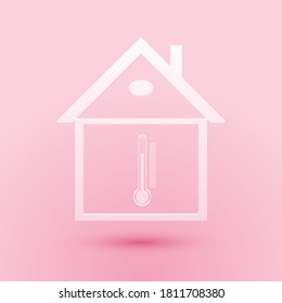 Paper cut House temperature icon isolated on pink background. Thermometer icon. Paper art style. Vector.