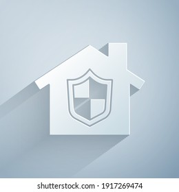 Paper Cut House Under Protection Icon Isolated On Grey Background. Home And Shield. Protection, Safety, Security, Protect, Defense Concept. Paper Art Style. Vector