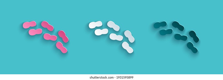 Paper cut Human footprints shoes icon isolated on blue background. Shoes sole. Paper art style. Vector