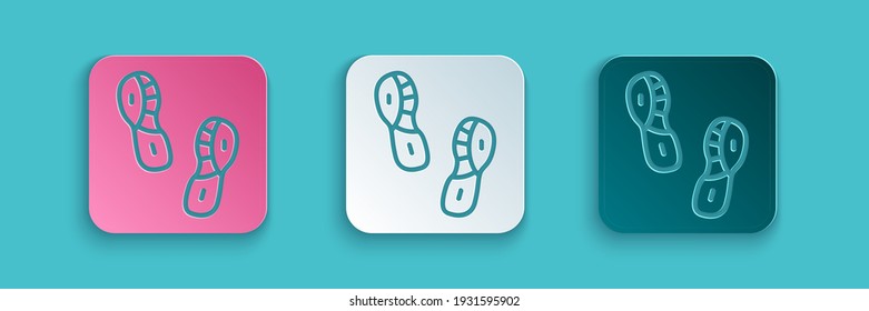 Paper cut Human footprints shoes icon isolated on blue background. Shoes sole. Paper art style. Vector