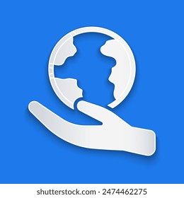 Paper cut Human hand holding Earth globe icon isolated on blue background. Save earth concept. Paper art style. Vector