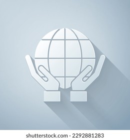 Paper cut Human hands holding Earth globe icon isolated on grey background. Save earth concept. Paper art style. Vector Illustration