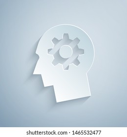 Paper cut Human head with gear inside icon isolated on grey background. Artificial intelligence. Thinking brain sign. Symbol work of brain. Paper art style. Vector Illustration