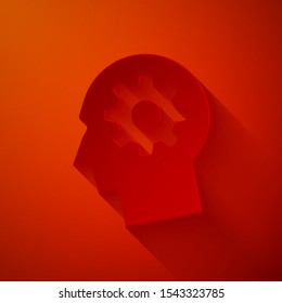 Paper cut Human head with gear inside icon isolated on red background. Artificial intelligence. Thinking brain sign. Symbol work of brain. Paper art style. Vector Illustration
