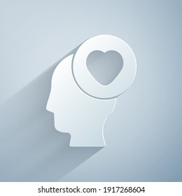 Paper cut Human head with heart icon isolated on grey background. Love concept with human head. Paper art style. Vector