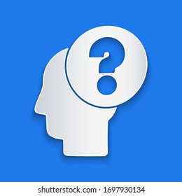 Paper cut Human head with question mark icon isolated on blue background. Paper art style. Vector Illustration