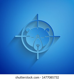 Paper cut Hunt on bear with crosshairs icon isolated on blue background. Hunting club logo with bear and target. Rifle lens aiming a bear. Paper art style. Vector Illustration