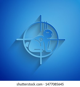 Paper cut Hunt on rabbit with crosshairs icon isolated on blue background. Hunting club logo with rabbit and target. Rifle lens aiming a hare. Paper art style. Vector Illustration
