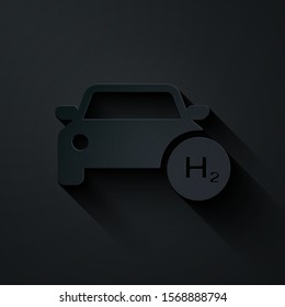 Paper cut Hydrogen car icon isolated on black background. H2 station sign. Hydrogen fuel cell car eco environment friendly zero emission. Paper art style. Vector Illustration