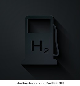 Paper cut Hydrogen filling station icon isolated on black background. H2 station sign. Paper art style. Vector Illustration