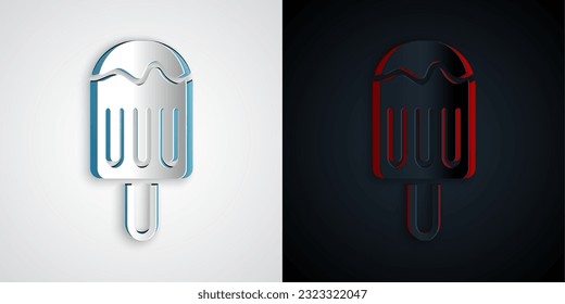 Paper cut Ice cream on stick icon isolated on grey and black background. Sweet symbol. Paper art style. Vector