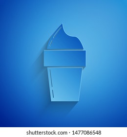 Paper cut Ice cream in waffle cone icon isolated on blue background. Sweet symbol. Paper art style. Vector Illustration