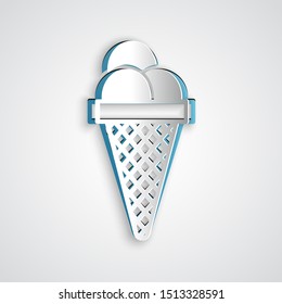 Paper cut Ice cream in waffle cone icon isolated on grey background. Sweet symbol. Paper art style. Vector Illustration