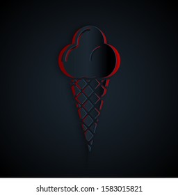 Paper cut Ice cream in waffle cone icon isolated on black background. Sweet symbol. Paper art style. Vector Illustration