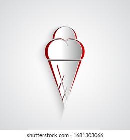 Paper cut Ice cream in waffle cone icon isolated on grey background. Sweet symbol. Paper art style. Vector Illustration