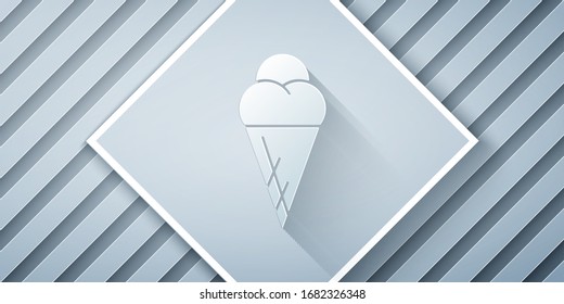 Paper cut Ice cream in waffle cone icon isolated on grey background. Sweet symbol. Paper art style. Vector Illustration