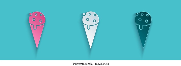 Paper cut Ice cream in waffle cone icon isolated on blue background. Sweet symbol. Paper art style. Vector Illustration