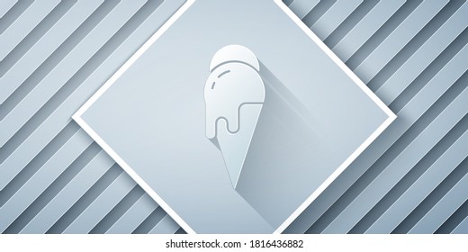 Paper cut Ice cream in waffle cone icon isolated on grey background. Sweet symbol. Paper art style. Vector