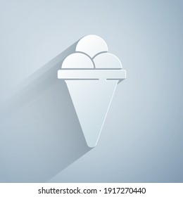 Paper cut Ice cream in waffle cone icon isolated on grey background. Sweet symbol. Paper art style. Vector