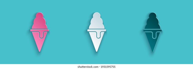 Paper cut Ice cream in waffle cone icon isolated on blue background. Sweet symbol. Paper art style. Vector