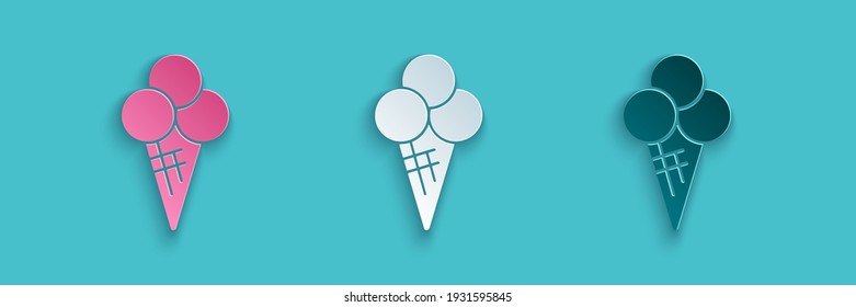 Paper cut Ice cream in waffle cone icon isolated on blue background. Sweet symbol. Paper art style. Vector